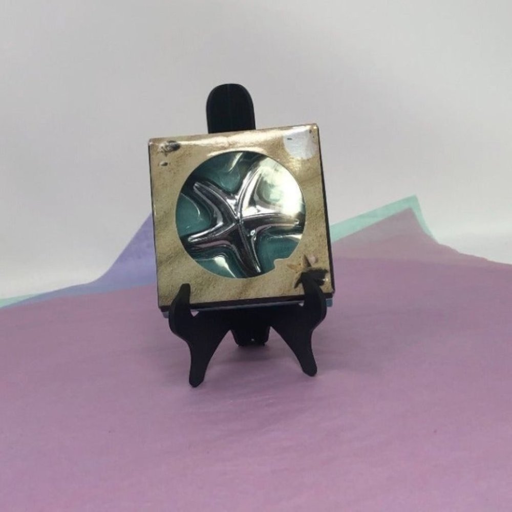 Starfish made metal bottle top cap opener. 3” x 3” x 3”, original box, no tag,